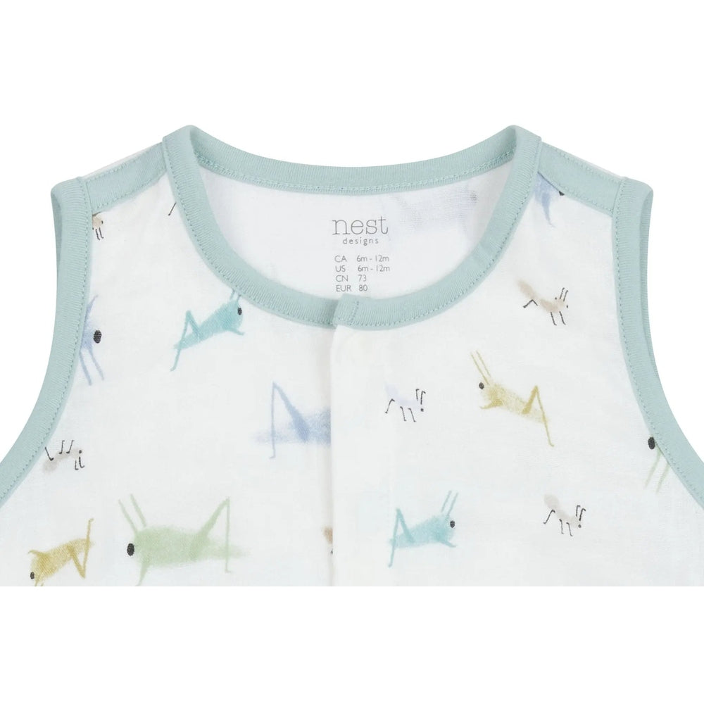 Nest Designs Bamboo Pima Sleeveless Onesie The Ant & The Grasshopper with mint trim, playful insect print laid flat.