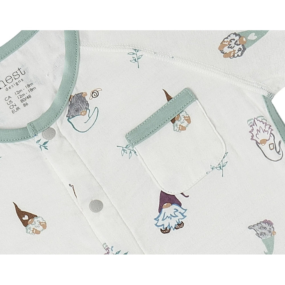 Nest Designs Oh Gnome bamboo short-sleeve romper, white with mint trim and gnome prints, front pocket visible.