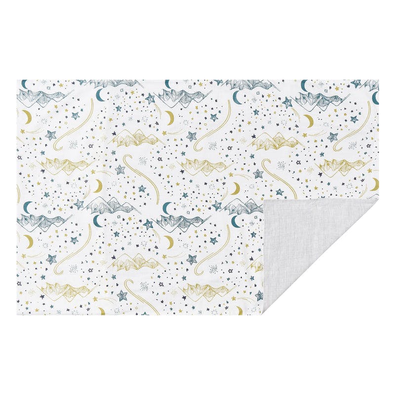 Nest Designs Bamboo Silk Toddler Pillow and Pillowcase in white starry print, corner folded back to show soft backing.