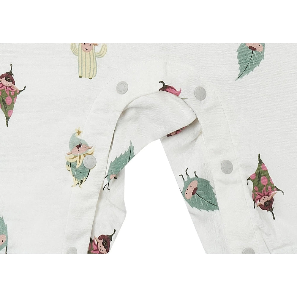 Nest Designs Bamboo Sleeveless Romper Pixie Dust, white fabric with colorful pixie prints; front snaps for easy dressing.