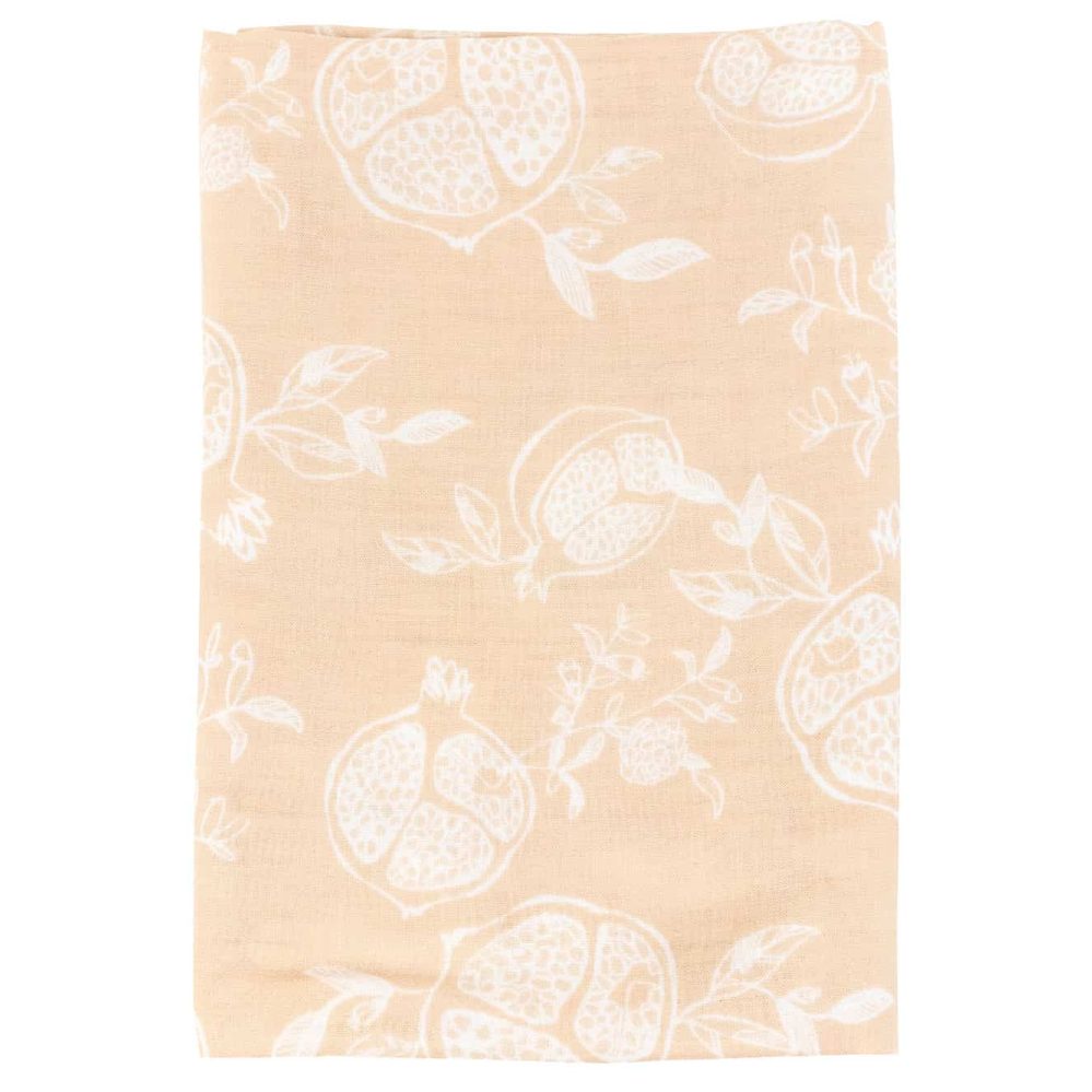 Nest Designs Bamboo Swaddle Blankie in peach, white pomegranate botanical print, laid flat.