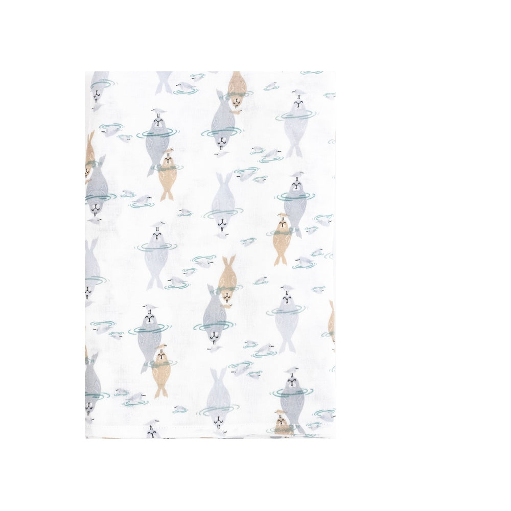 Nest Designs Bamboo Swaddle Blankie in white with blue and beige sea creatures, spread flat as a soft baby blanket.
