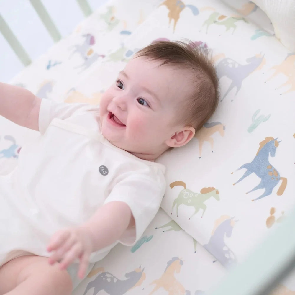 Nest Designs Jersey Nook Toddler Pillow with Pillowcase Pony Express in White with Pastel Horse Print
