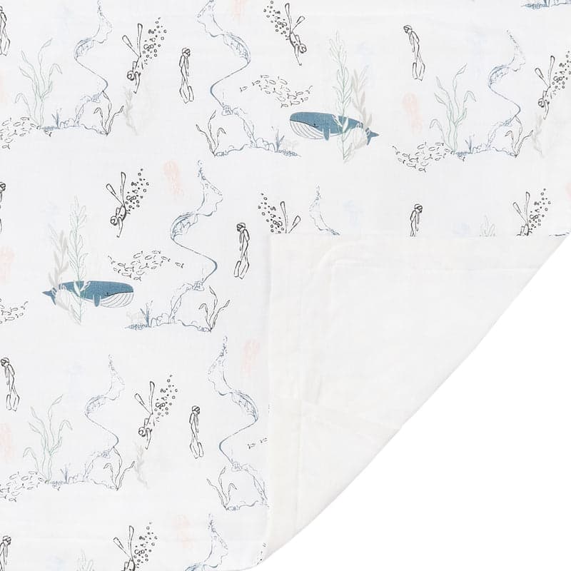 Nest Designs bamboo toddler pillowcase with blue whale motif on white, showing multiple whales among sea plants.