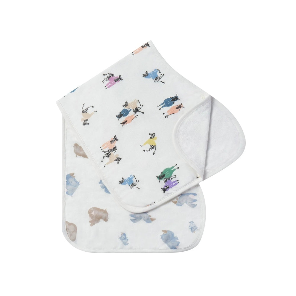 Nest Designs Burp'N Bib 2-Pack burp cloths in white with colorful animal prints, folded and laid flat for protection.