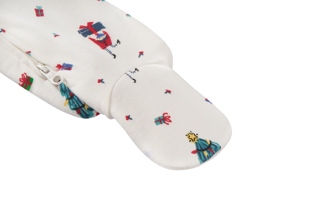Nest Designs Santas Elves: close-up of the enclosed foot of the footed sleeper