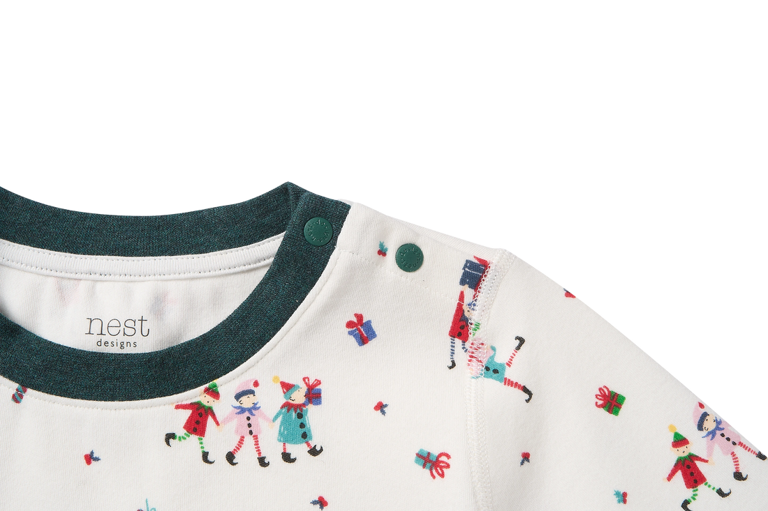 Nest Designs Santas Elves: shoulder snap detail on the smaller sizes of the child pajama top