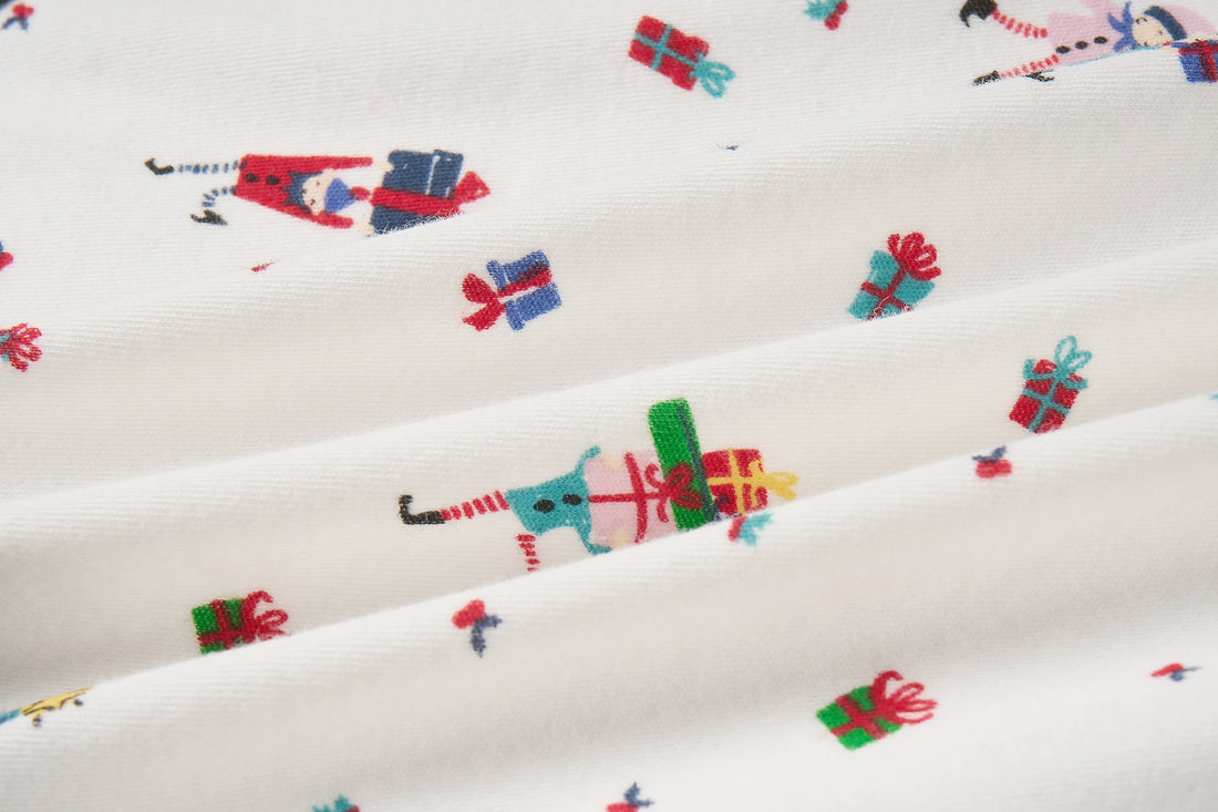 Nest Designs Santas Elves: close-up of the soft knit and Santa Elves print