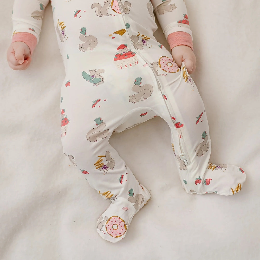 NEST DESIGNS Nest Designs Long Sleeve Footed Sleeper Very Squirrelly Front zipper with pink ribbed cuffs and donut prints on feet img 3/6