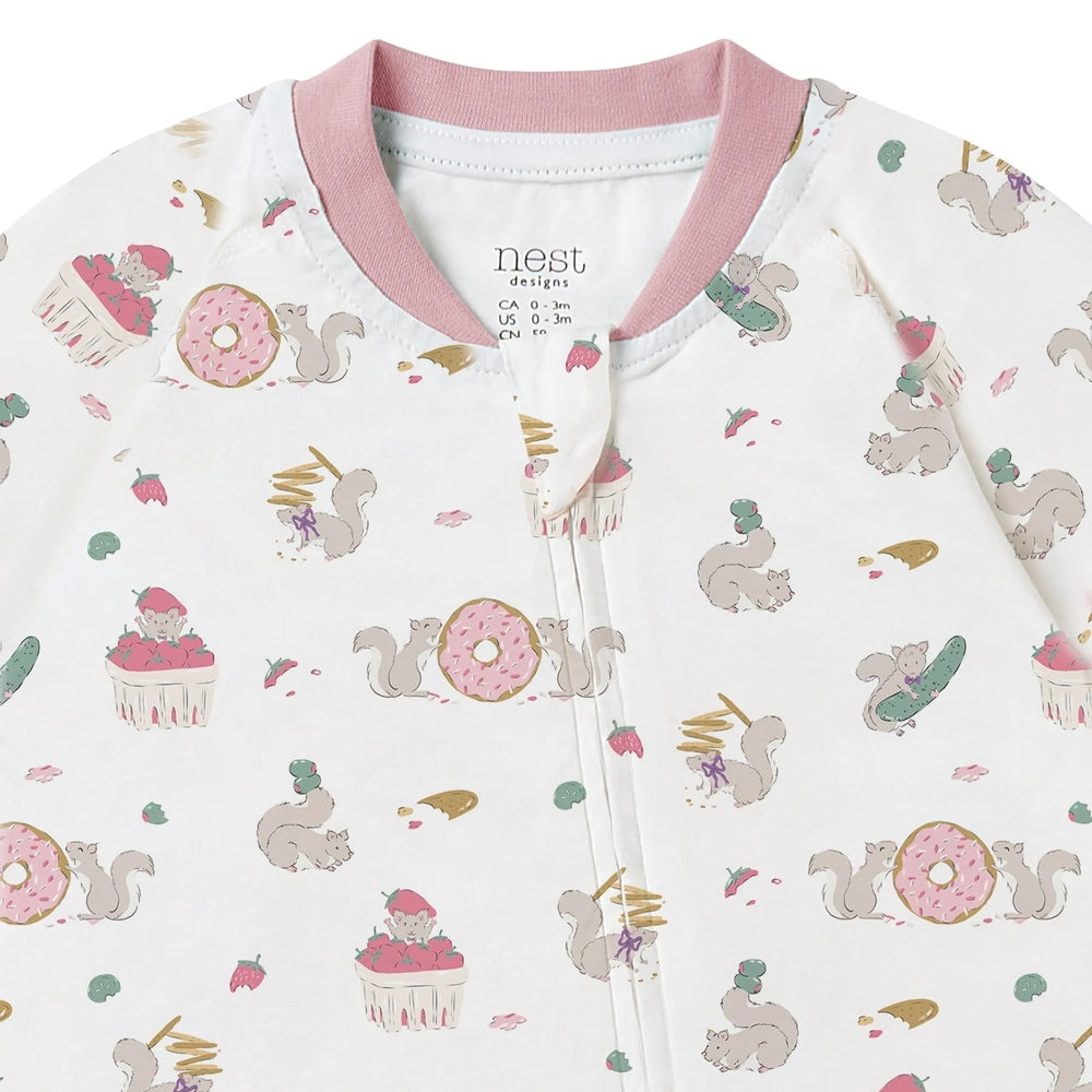 NEST DESIGNS Nest Designs Long Sleeve Footed Sleeper Very Squirrelly snap button closure with pink ribbed collar and food print img 6/6