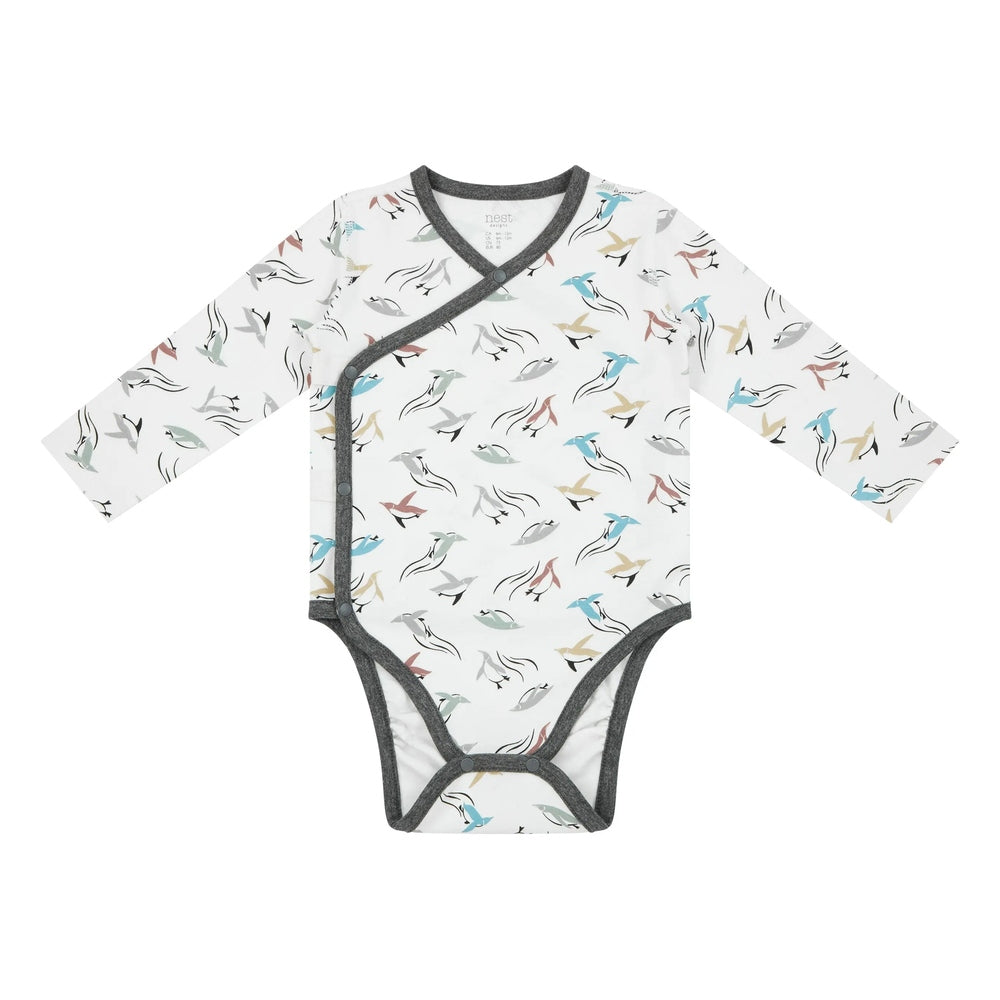 Nest Designs Organic Cotton Kimono Onesie, white with dark gray trim and rainbow bird print, wrap-style snaps.