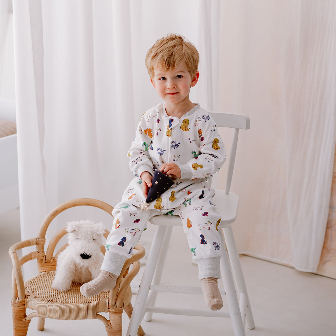 Nest Designs Bingo long sleeve footed sleep bag shown in a toddler lifestyle setting