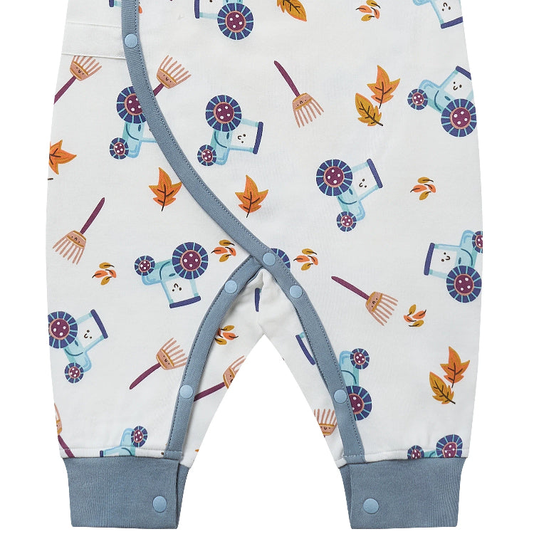 Nest Designs Organic Cotton Long Sleeve Kimono Romper On The Farm; cream romper with blue farm-print characters, blue trim and snaps.