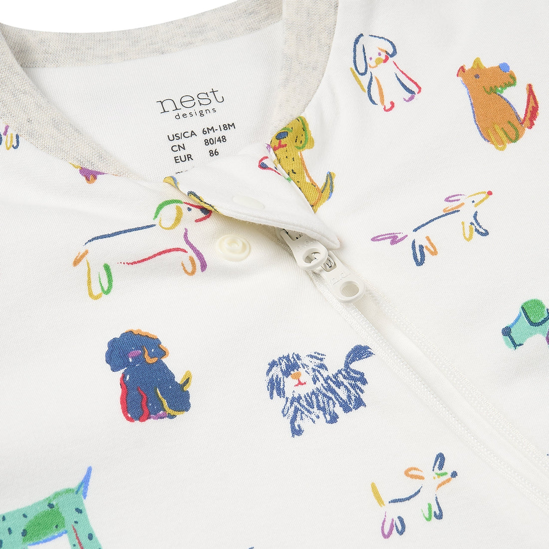 Bingo sleep bag neckline, snap placket and colorful dog print in close-up