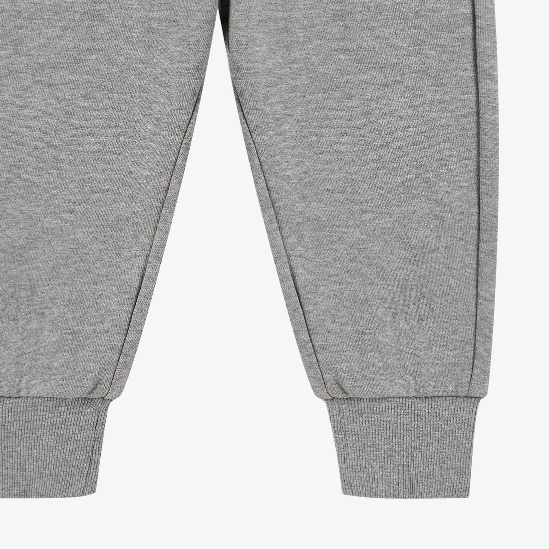 Nest Designs Joggers in Pebble Grey, lower-leg detail highlighting tapered legs and wide ribbed ankle cuffs