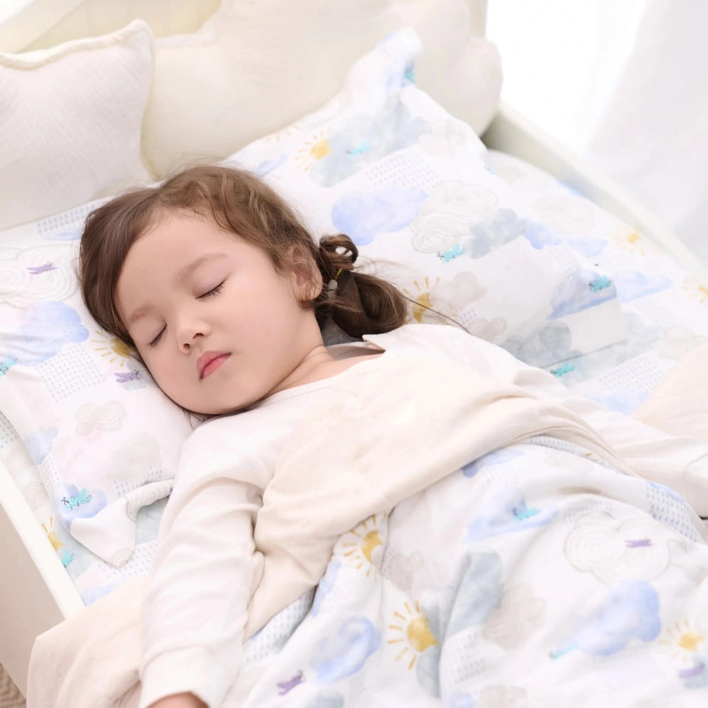 NEST DESIGNS Nest Designs Pillowcase Fluffy Puffs pastel cloud, sun, and butterfly print on white fabric img 2/8