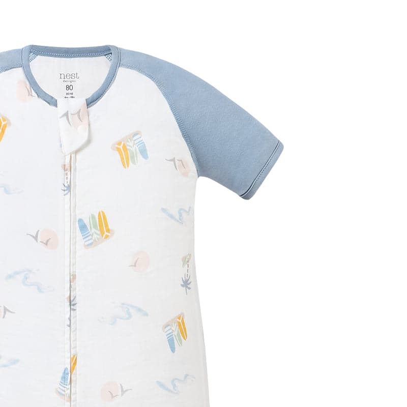 Nest Designs Raglan Bamboo Pima Short Sleeve Footed Sleep Bag 0.6 Tog Pastel Waves with blue sleeves