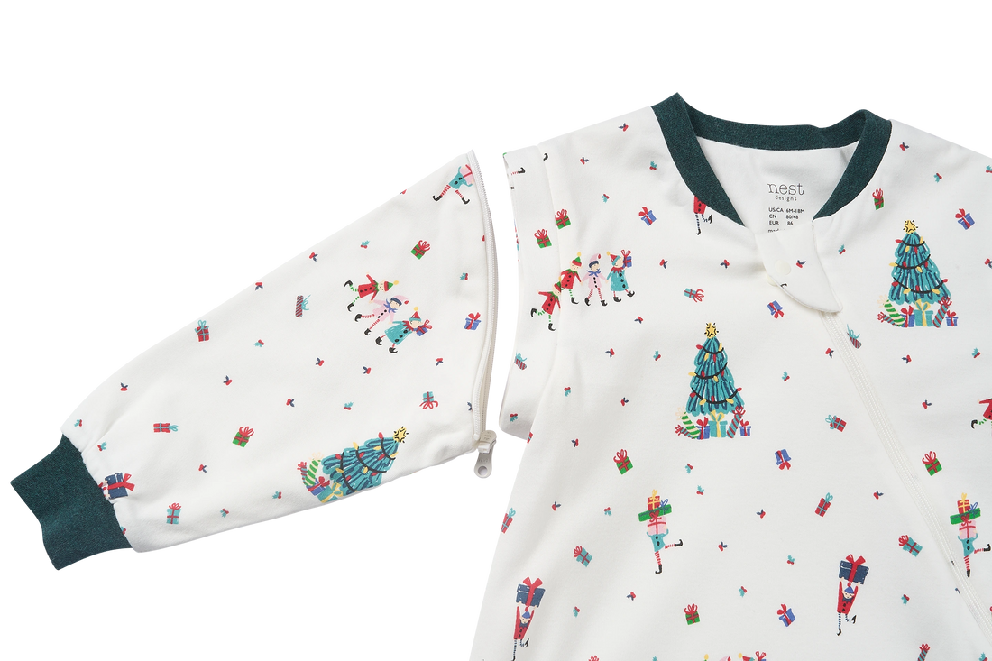 Nest Designs Santas Elves: printed sleeve unzipped at the shoulder to show its removable attachment