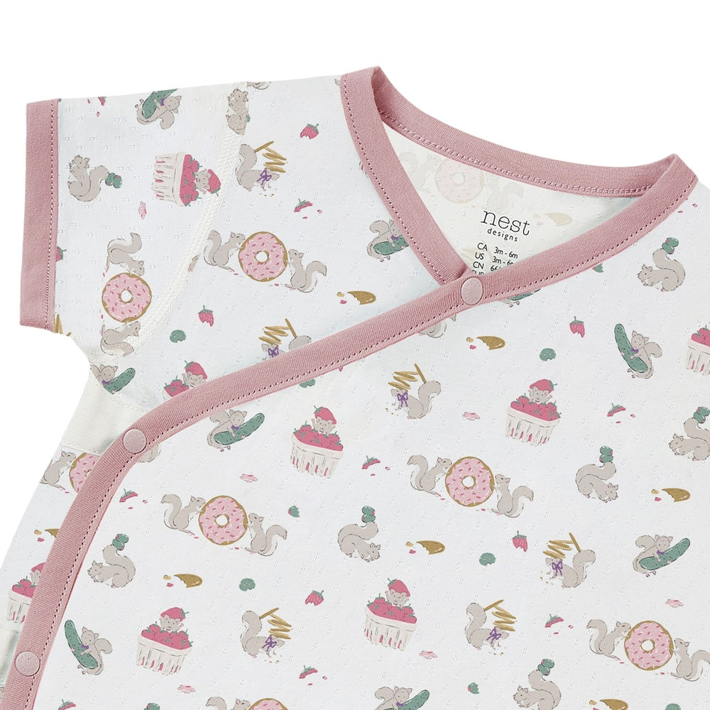 NEST DESIGNS Nest Designs Short Sleeve Kimono Onesie Very Squirrelly diagonal snap closure with pink trim and donut cupcake print img 3/3