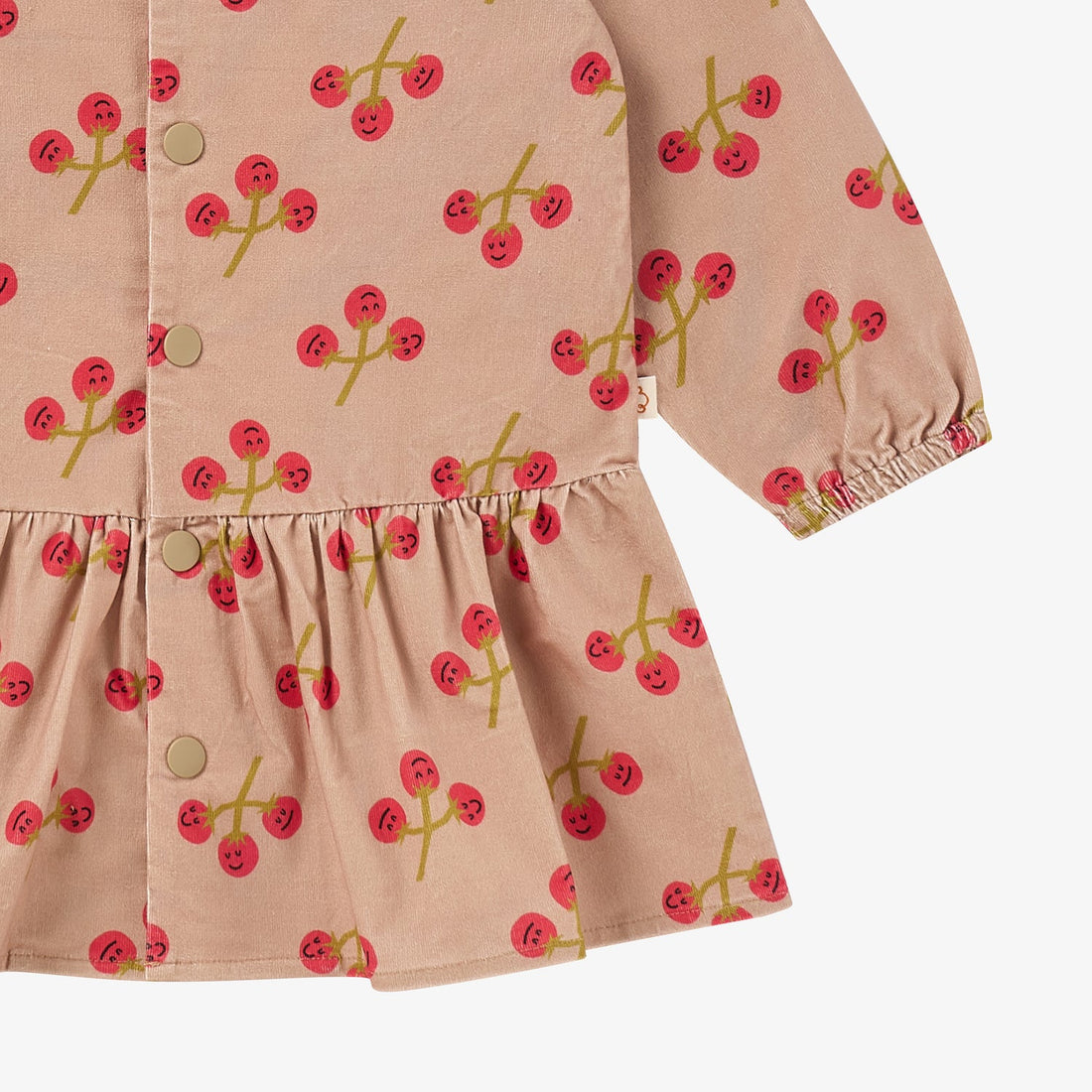 Nest Designs You're So Vine blush corduroy dress, lower detail of gathered waist, flared hem, and elastic cuff