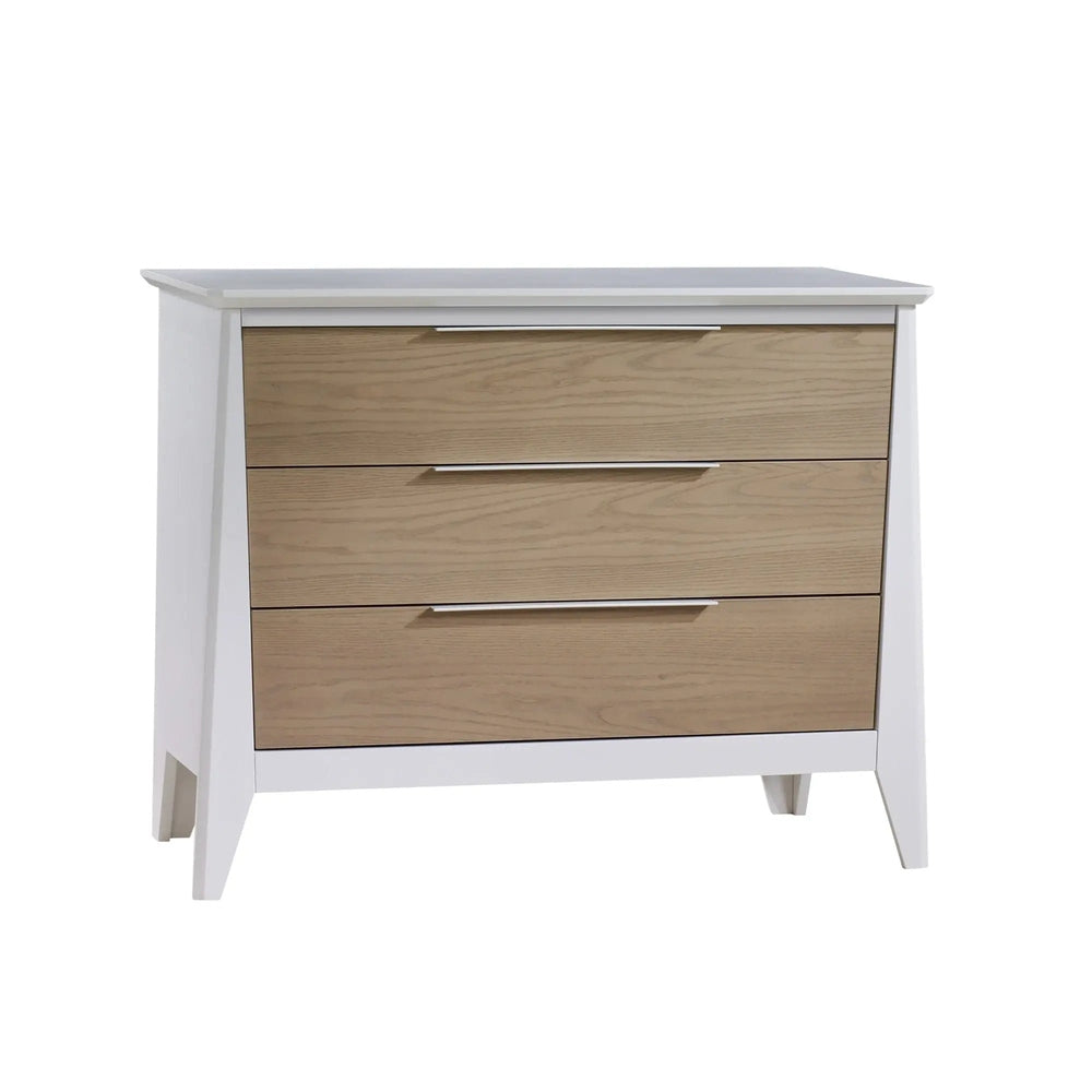 Nest Flexx Premium 3 Drawer XL Dresser in white frame with natural oak drawers and silver handles, showing sturdy angled legs.