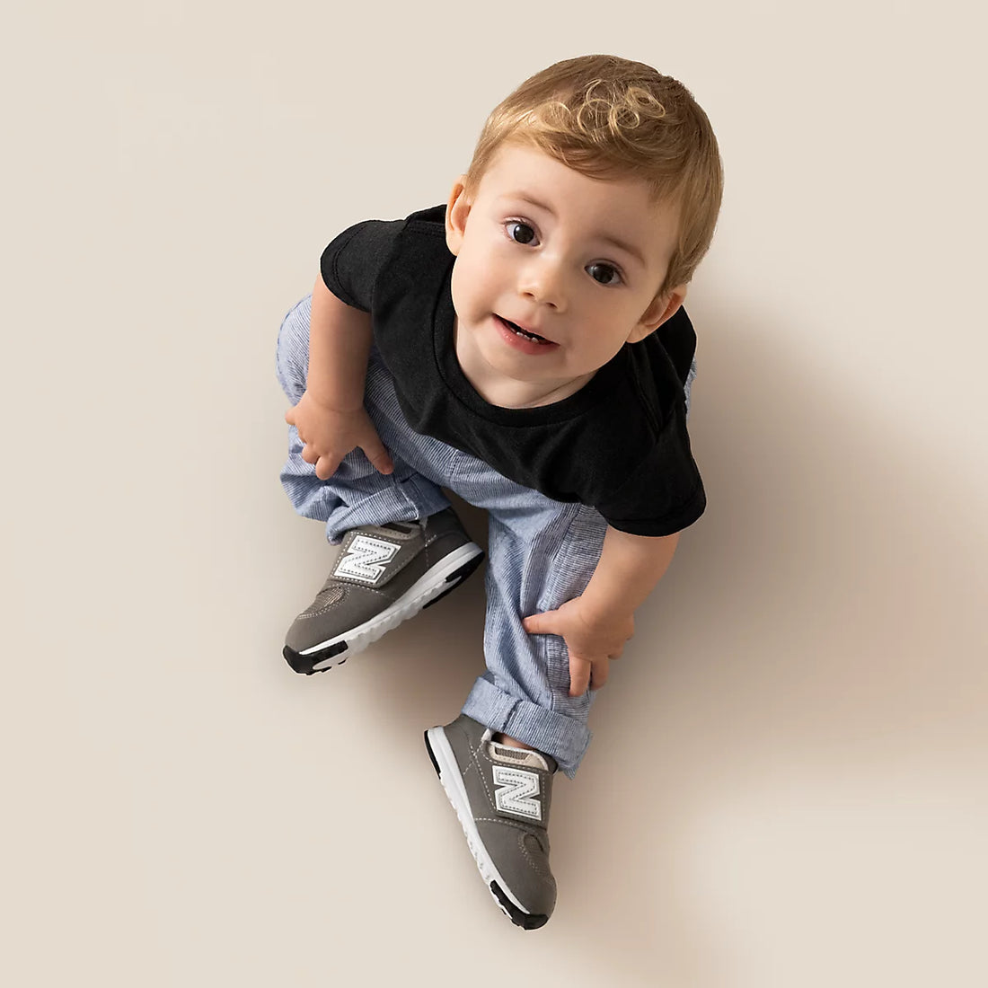 New Balance 574 NEW-B Hook & Loop Shoes in Rain Cloud With White — overhead on foot lifestyle
