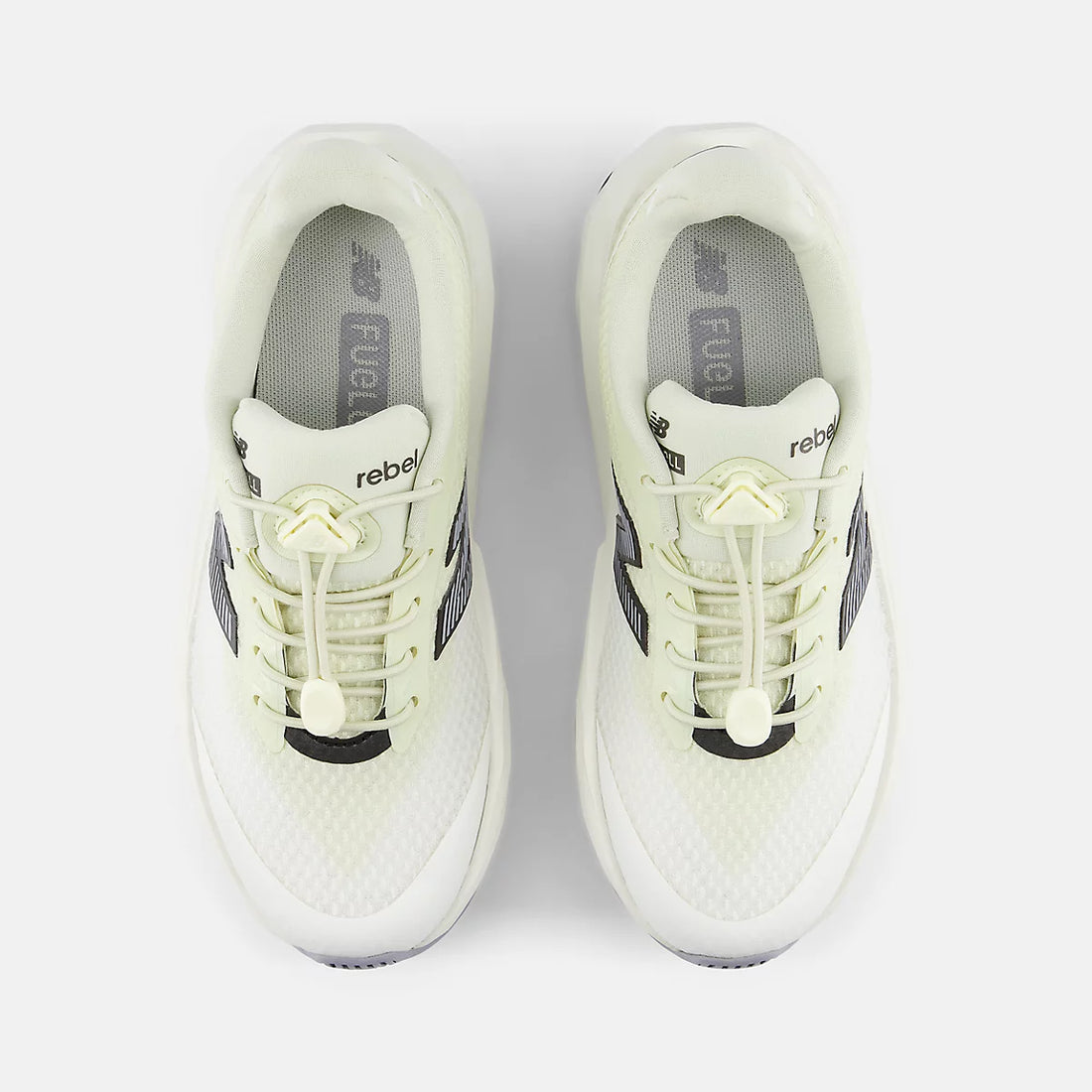 New Balance FuelCell Rebel Bungee Lace With Toggle Shoes in Pistachio Butter With Sea Salt And Digital Mist — top pair
