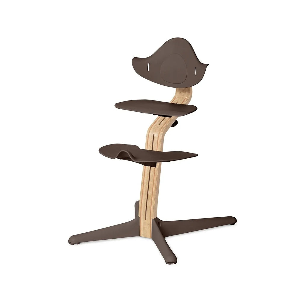 NOMI Chair White Oak high chair with dark brown seats/backrest and natural wood frame.