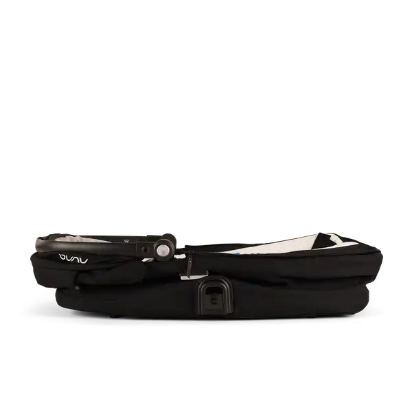 Nuna DEMI next Bassinet in Caviar folded flat in side profile