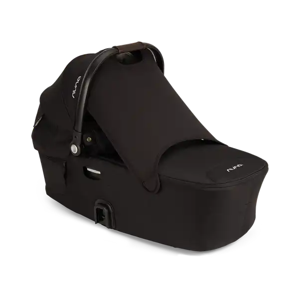 Nuna DEMI next Bassinet in Caviar with protective drape extended