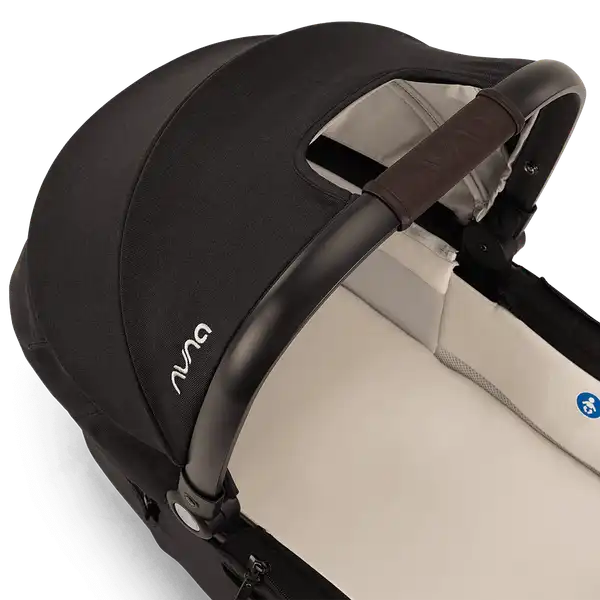 Nuna DEMI next Bassinet interior with leatherette carry handle and light lining