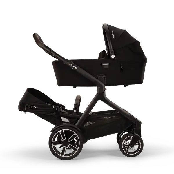 Nuna DEMI next Bassinet — Nuna DEMI next stroller with Caviar bassinet above and sibling seat below
