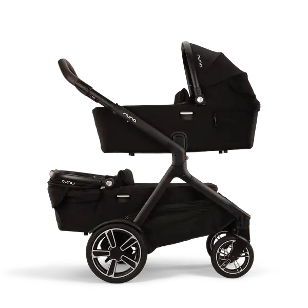 Nuna DEMI next Bassinet — Nuna DEMI next stroller with two Caviar bassinets in stacked twin mode