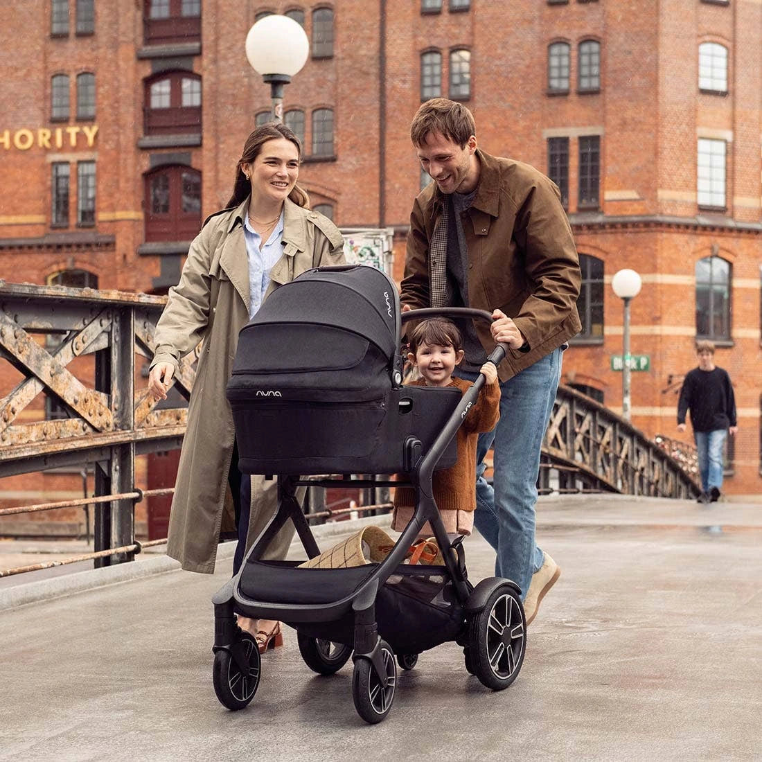 Family outing with Nuna DEMI Next Caviar, rider board and bassinet (bassinet sold separately)