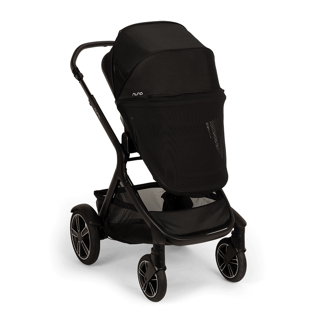 Nuna DEMI Next — Caviar — privacy drape angle