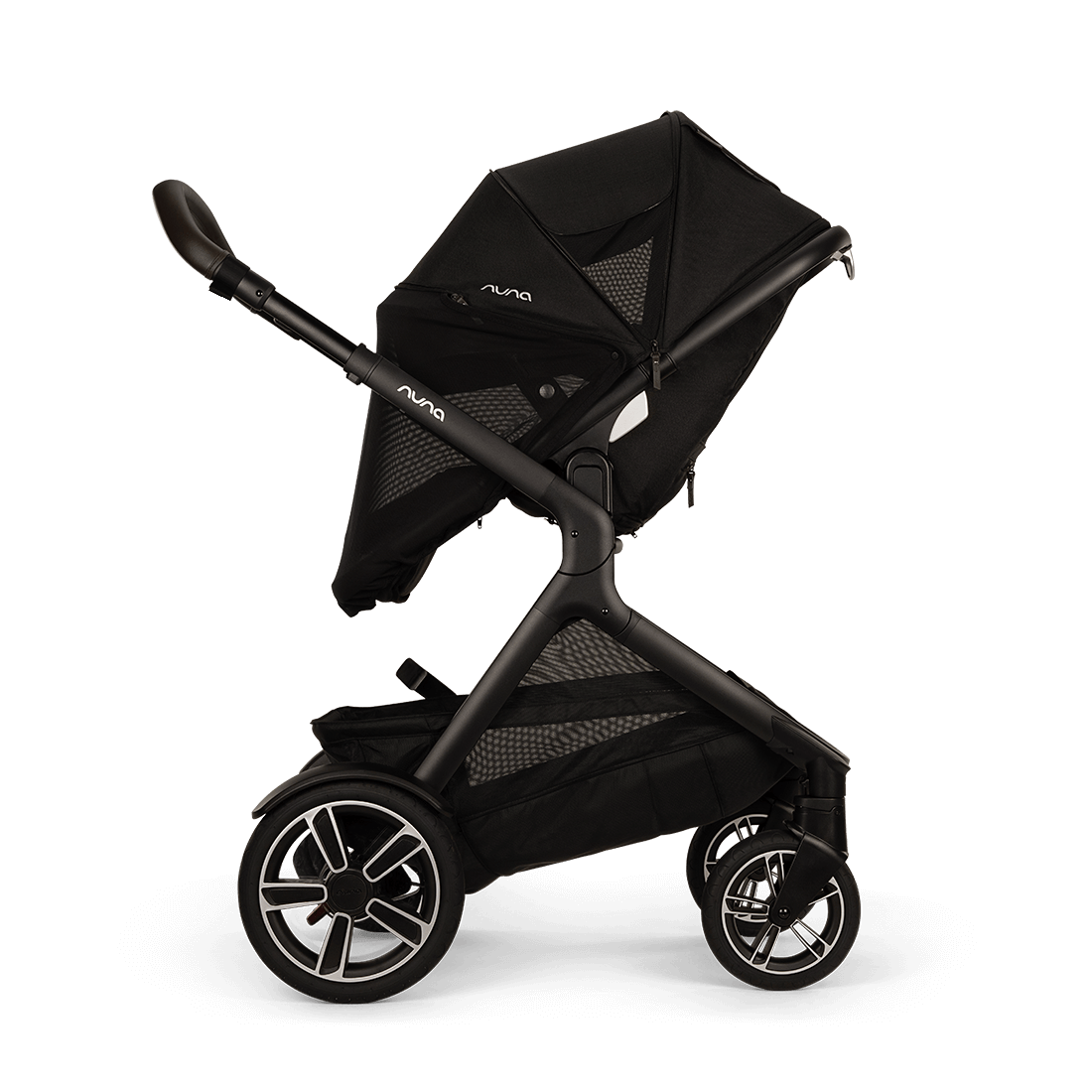 Nuna DEMI Next — Caviar — privacy drape parent facing