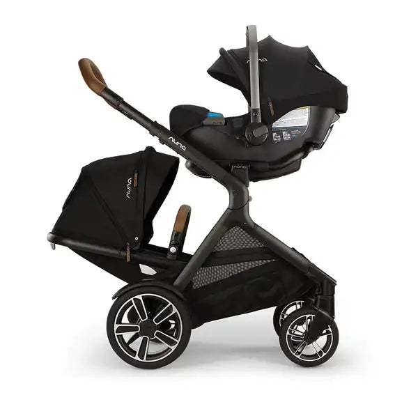Nuna DEMI next Sibling Seat — Nuna DEMI next stroller with Caviar sibling seat below and infant car seat above