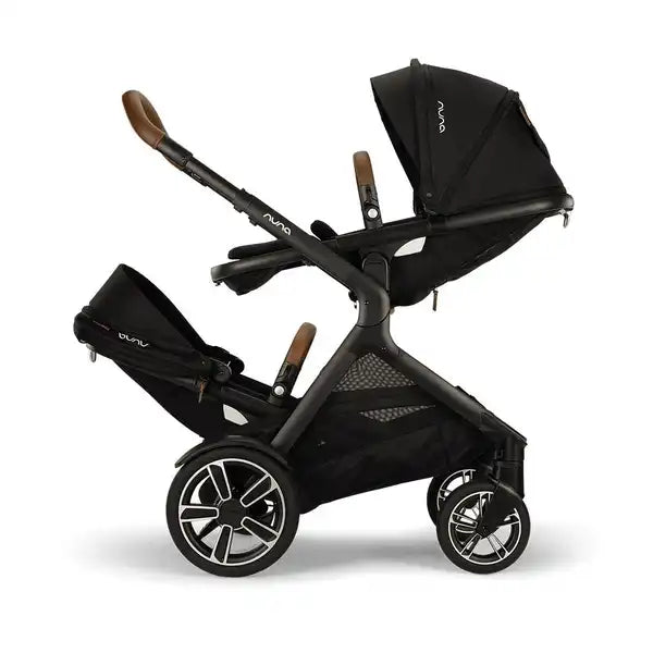 Nuna DEMI next Sibling Seat — Nuna DEMI next stroller with Caviar sibling seats in opposite-facing tandem positions