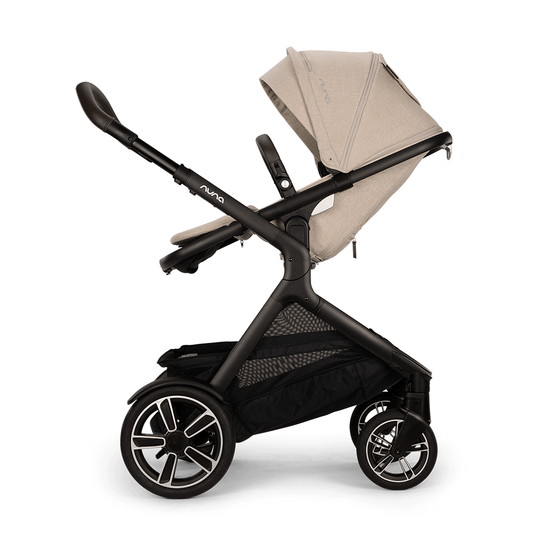 Nuna DEMI next Stroller with Rider Board — Biscotti parent-facing upright position