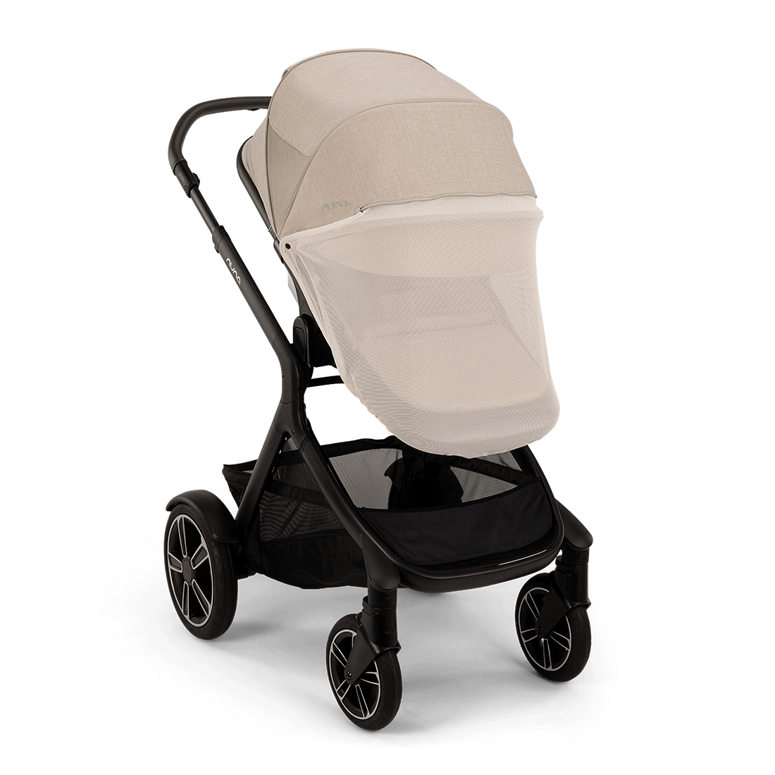 Nuna DEMI next Stroller with Rider Board — Biscotti rear three-quarter view with privacy drape