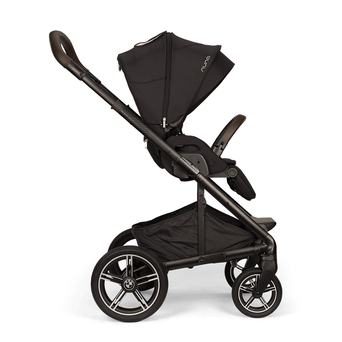 Nuna MIXX next Stroller — black stroller side profile with forward-facing seat and canopy extended