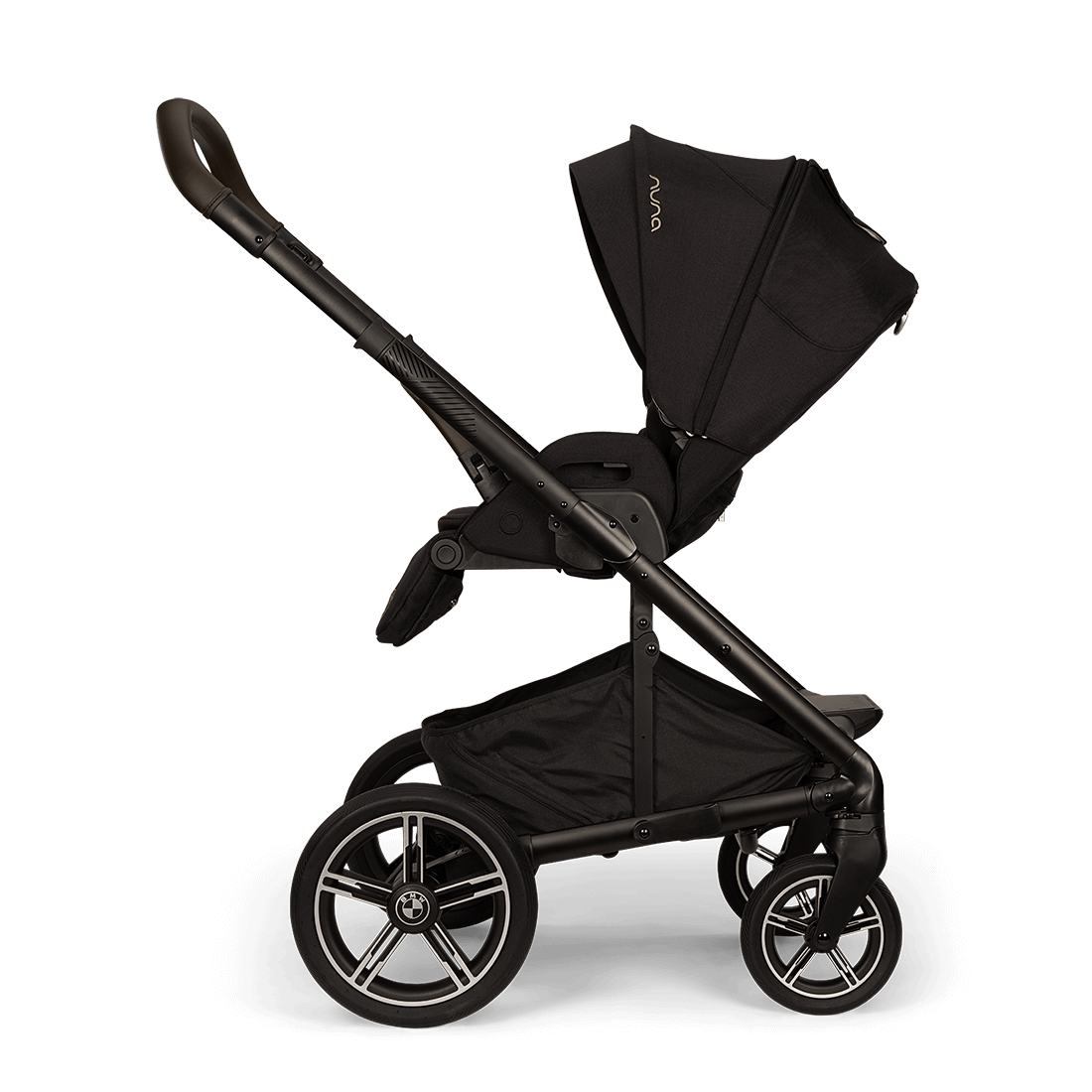 Nuna MIXX next Stroller — black stroller side profile with upright seat and canopy extended