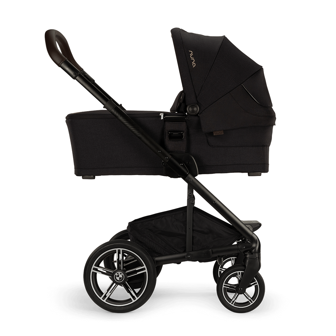Nuna MIXX next Stroller — black stroller with bassinet in side profile