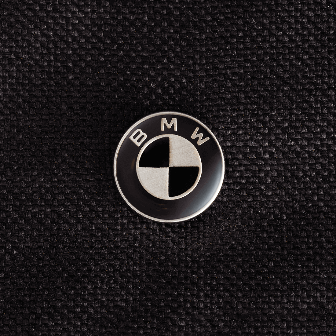 Nuna MIXX next Stroller — BMW roundel close-up on black stroller fabric
