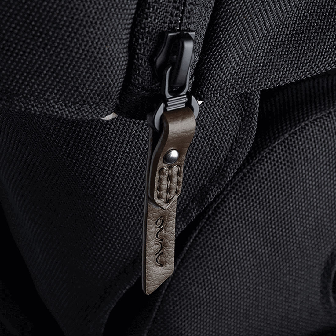 Nuna MIXX Next Stroller in Caviar - Nuna zipper pull close-up