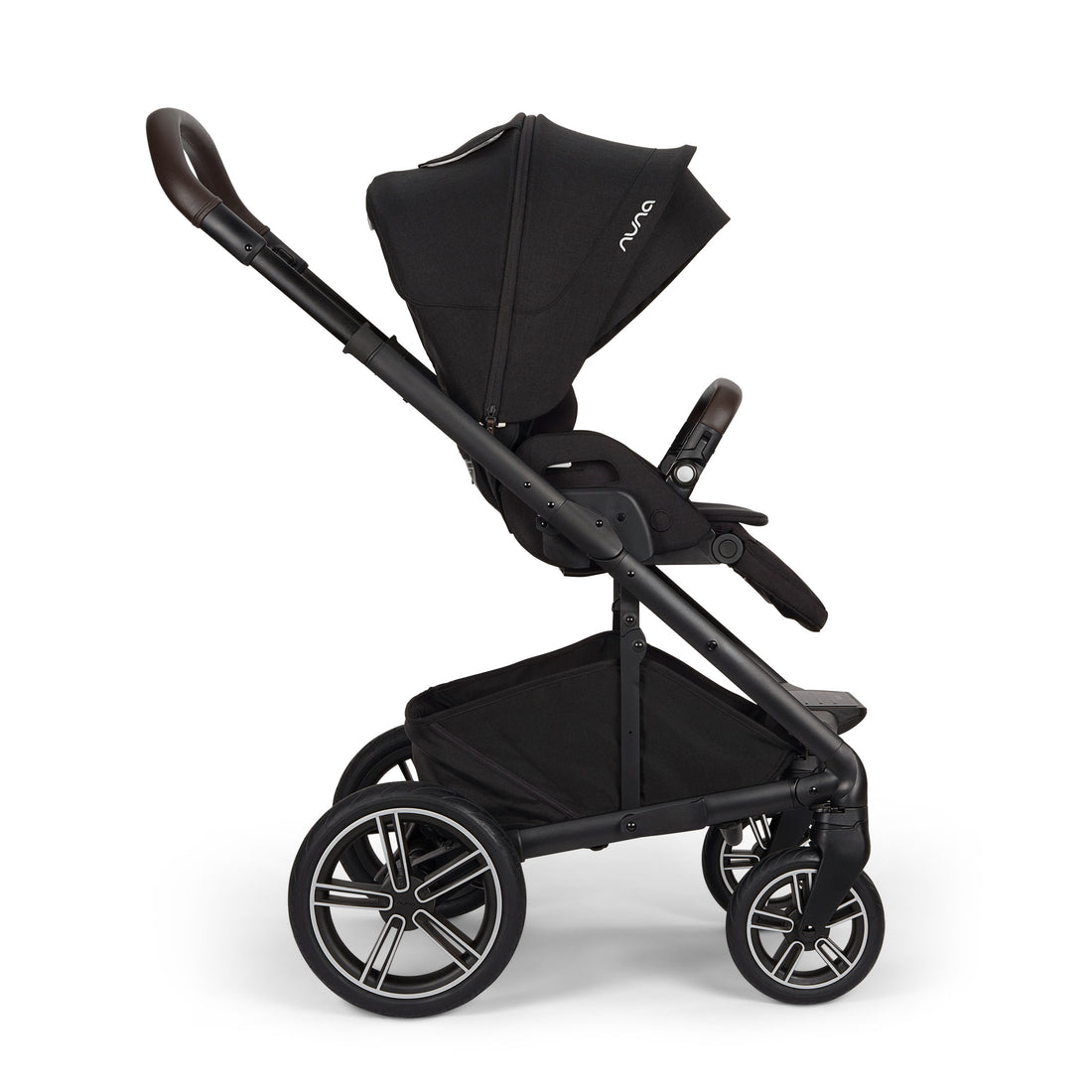 Nuna MIXX Next Stroller in Caviar - side view with forward-facing seat and canopy extended