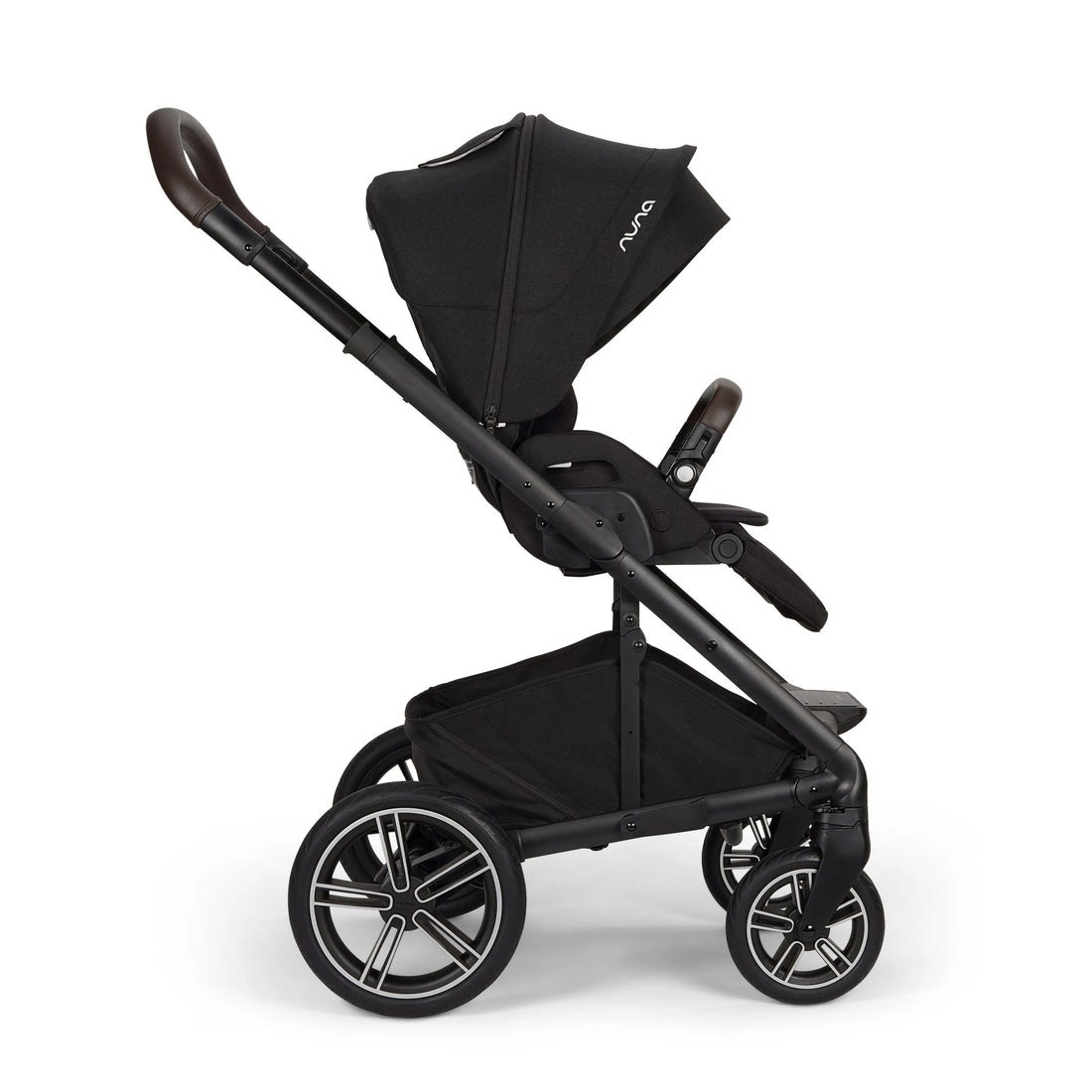 Nuna MIXX Next Stroller + PIPA Urbn Infant Car Seat Travel System showing Nuna MIXX Next Stroller in Caviar - side view with forward-facing seat and canopy extended