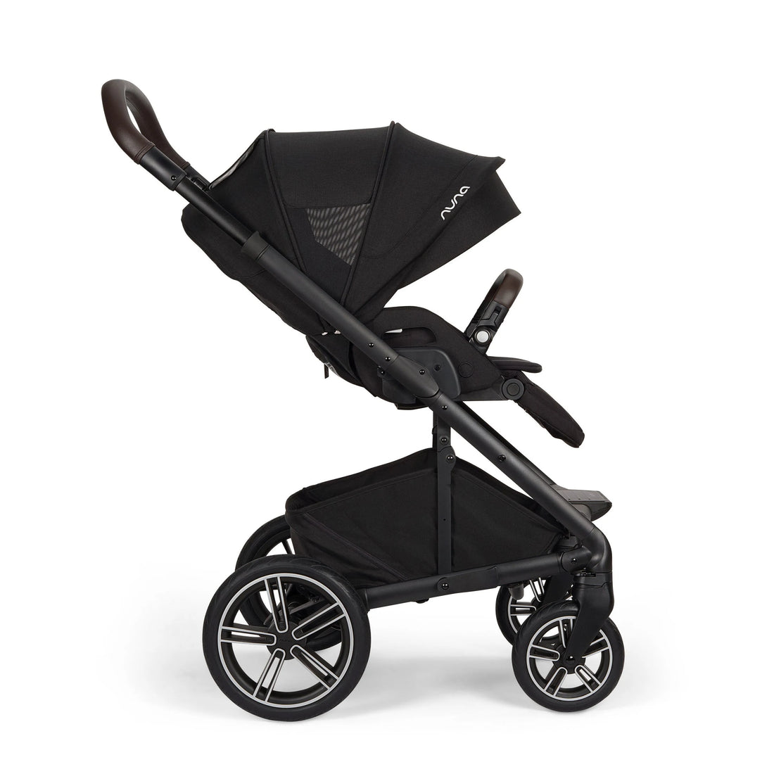 Nuna MIXX Next Stroller + PIPA Urbn Infant Car Seat Travel System showing Nuna MIXX Next Stroller in Caviar - side view with parent-facing seat and canopy ventilation open
