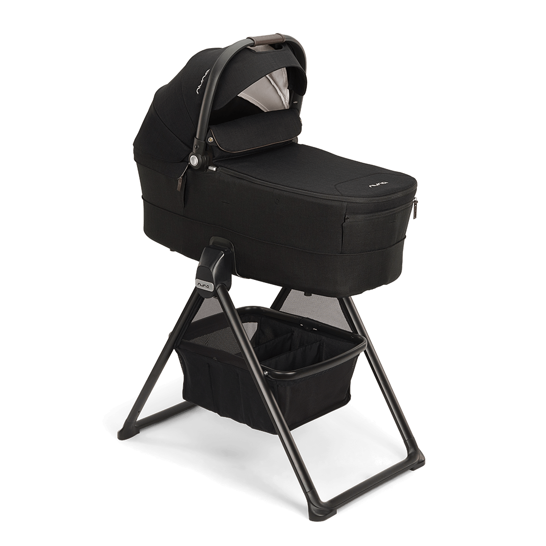 Nuna MIXX Series Bassinet — black bassinet on stand in three-quarter view