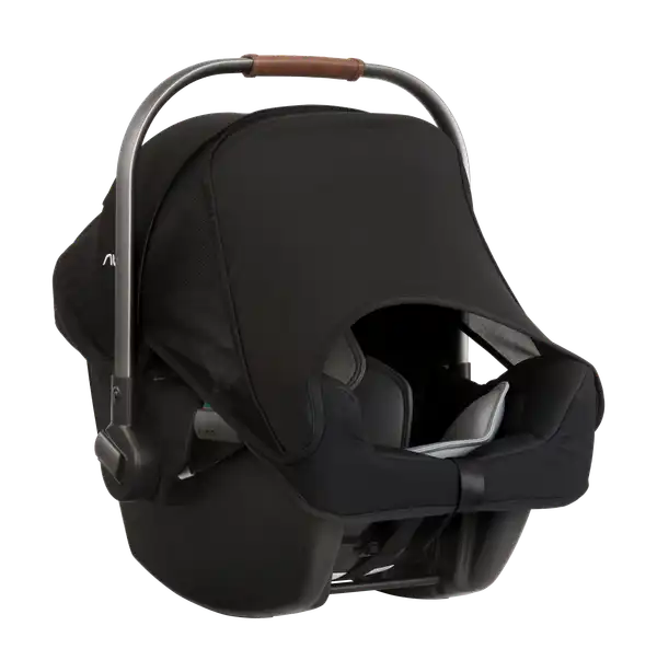 Nuna PIPA Infant Car Seat in Caviar - front three-quarter view with Dream drape extended